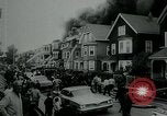 Image of Twenty-three tenement houses consumed by fire in Dorchester area of Boston Boston Massachusetts USA, 1964, second 7 stock footage video 65675035421