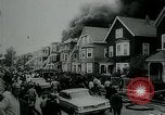 Image of Twenty-three tenement houses consumed by fire in Dorchester area of Boston Boston Massachusetts USA, 1964, second 8 stock footage video 65675035421