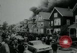 Image of Twenty-three tenement houses consumed by fire in Dorchester area of Boston Boston Massachusetts USA, 1964, second 9 stock footage video 65675035421