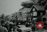 Image of Twenty-three tenement houses consumed by fire in Dorchester area of Boston Boston Massachusetts USA, 1964, second 10 stock footage video 65675035421
