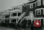 Image of Twenty-three tenement houses consumed by fire in Dorchester area of Boston Boston Massachusetts USA, 1964, second 11 stock footage video 65675035421