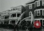 Image of Twenty-three tenement houses consumed by fire in Dorchester area of Boston Boston Massachusetts USA, 1964, second 12 stock footage video 65675035421