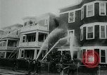Image of Twenty-three tenement houses consumed by fire in Dorchester area of Boston Boston Massachusetts USA, 1964, second 13 stock footage video 65675035421