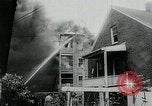 Image of Twenty-three tenement houses consumed by fire in Dorchester area of Boston Boston Massachusetts USA, 1964, second 16 stock footage video 65675035421