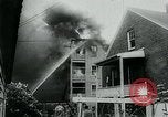Image of Twenty-three tenement houses consumed by fire in Dorchester area of Boston Boston Massachusetts USA, 1964, second 17 stock footage video 65675035421