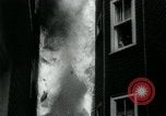 Image of Twenty-three tenement houses consumed by fire in Dorchester area of Boston Boston Massachusetts USA, 1964, second 19 stock footage video 65675035421