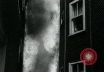 Image of Twenty-three tenement houses consumed by fire in Dorchester area of Boston Boston Massachusetts USA, 1964, second 20 stock footage video 65675035421