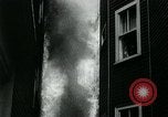 Image of Twenty-three tenement houses consumed by fire in Dorchester area of Boston Boston Massachusetts USA, 1964, second 21 stock footage video 65675035421