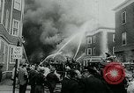 Image of Twenty-three tenement houses consumed by fire in Dorchester area of Boston Boston Massachusetts USA, 1964, second 32 stock footage video 65675035421