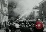 Image of Twenty-three tenement houses consumed by fire in Dorchester area of Boston Boston Massachusetts USA, 1964, second 33 stock footage video 65675035421