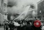 Image of Twenty-three tenement houses consumed by fire in Dorchester area of Boston Boston Massachusetts USA, 1964, second 34 stock footage video 65675035421