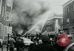 Image of Twenty-three tenement houses consumed by fire in Dorchester area of Boston Boston Massachusetts USA, 1964, second 35 stock footage video 65675035421