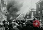 Image of Twenty-three tenement houses consumed by fire in Dorchester area of Boston Boston Massachusetts USA, 1964, second 36 stock footage video 65675035421