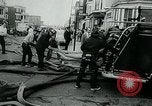 Image of Twenty-three tenement houses consumed by fire in Dorchester area of Boston Boston Massachusetts USA, 1964, second 37 stock footage video 65675035421