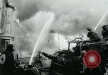Image of Twenty-three tenement houses consumed by fire in Dorchester area of Boston Boston Massachusetts USA, 1964, second 44 stock footage video 65675035421