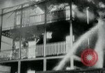 Image of Twenty-three tenement houses consumed by fire in Dorchester area of Boston Boston Massachusetts USA, 1964, second 51 stock footage video 65675035421