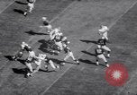 Standbild American Football United States USA, 1964, aus Sekunde 25 historischem Filmmaterial Videoclip 65675035460