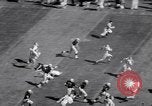 Standbild American Football United States USA, 1964, aus Sekunde 30 historischem Filmmaterial Videoclip 65675035460