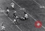 Immagine di Football americano Columbus Ohio USA, 1951, secondo 16 filmato di repertorio 65675035475