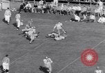 Standbild American Football United States USA, 1953, aus Sekunde 15 historischem Filmmaterial Videoclip 65675035501