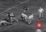 Standbild American Football United States USA, 1953, aus Sekunde 58 historischem Filmmaterial Videoclip 65675035501