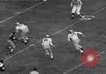 Standbild American Football United States USA, 1953, aus Sekunde 59 historischem Filmmaterial Videoclip 65675035501