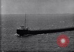 Image of ore freighter United States USA, 1920, second 30 stock footage video 65675035526
