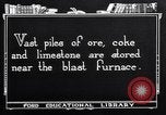 Image of blast furnace and slag pit United States USA, 1920, second 7 stock footage video 65675035528