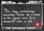 Image of blast furnace and slag pit United States USA, 1920, second 59 stock footage video 65675035528