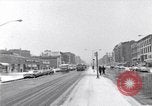 Image of Lenox Avenue, Harlem, New York City, on a snowy day New York City USA, 1963, second 1 stock footage video 65675035550