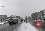 Image of Lenox Avenue, Harlem, New York City, on a snowy day New York City USA, 1963, second 5 stock footage video 65675035550