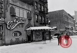 Image of Lenox Avenue, Harlem, New York City, on a snowy day New York City USA, 1963, second 9 stock footage video 65675035550