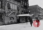 Image of Lenox Avenue, Harlem, New York City, on a snowy day New York City USA, 1963, second 11 stock footage video 65675035550