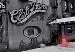 Image of Lenox Avenue, Harlem, New York City, on a snowy day New York City USA, 1963, second 21 stock footage video 65675035550