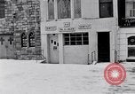 Image of Lenox Avenue, Harlem, New York City, on a snowy day New York City USA, 1963, second 22 stock footage video 65675035550