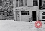 Image of Lenox Avenue, Harlem, New York City, on a snowy day New York City USA, 1963, second 24 stock footage video 65675035550