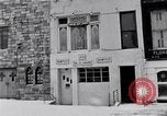 Image of Lenox Avenue, Harlem, New York City, on a snowy day New York City USA, 1963, second 25 stock footage video 65675035550