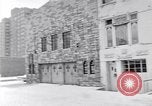 Image of Lenox Avenue, Harlem, New York City, on a snowy day New York City USA, 1963, second 29 stock footage video 65675035550