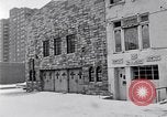 Image of Lenox Avenue, Harlem, New York City, on a snowy day New York City USA, 1963, second 30 stock footage video 65675035550