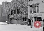 Image of Lenox Avenue, Harlem, New York City, on a snowy day New York City USA, 1963, second 31 stock footage video 65675035550