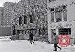 Image of Lenox Avenue, Harlem, New York City, on a snowy day New York City USA, 1963, second 32 stock footage video 65675035550