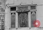 Image of Lenox Avenue, Harlem, New York City, on a snowy day New York City USA, 1963, second 39 stock footage video 65675035550