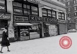 Image of Lenox Avenue, Harlem, New York City, on a snowy day New York City USA, 1963, second 44 stock footage video 65675035550
