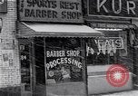 Image of Lenox Avenue, Harlem, New York City, on a snowy day New York City USA, 1963, second 46 stock footage video 65675035550