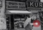 Image of Lenox Avenue, Harlem, New York City, on a snowy day New York City USA, 1963, second 48 stock footage video 65675035550