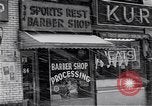 Image of Lenox Avenue, Harlem, New York City, on a snowy day New York City USA, 1963, second 50 stock footage video 65675035550