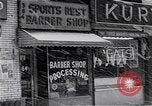 Image of Lenox Avenue, Harlem, New York City, on a snowy day New York City USA, 1963, second 51 stock footage video 65675035550