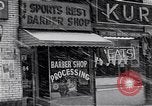 Image of Lenox Avenue, Harlem, New York City, on a snowy day New York City USA, 1963, second 52 stock footage video 65675035550