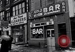 Image of Lenox Avenue, Harlem, New York City, on a snowy day New York City USA, 1963, second 53 stock footage video 65675035550