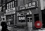 Image of Lenox Avenue, Harlem, New York City, on a snowy day New York City USA, 1963, second 54 stock footage video 65675035550